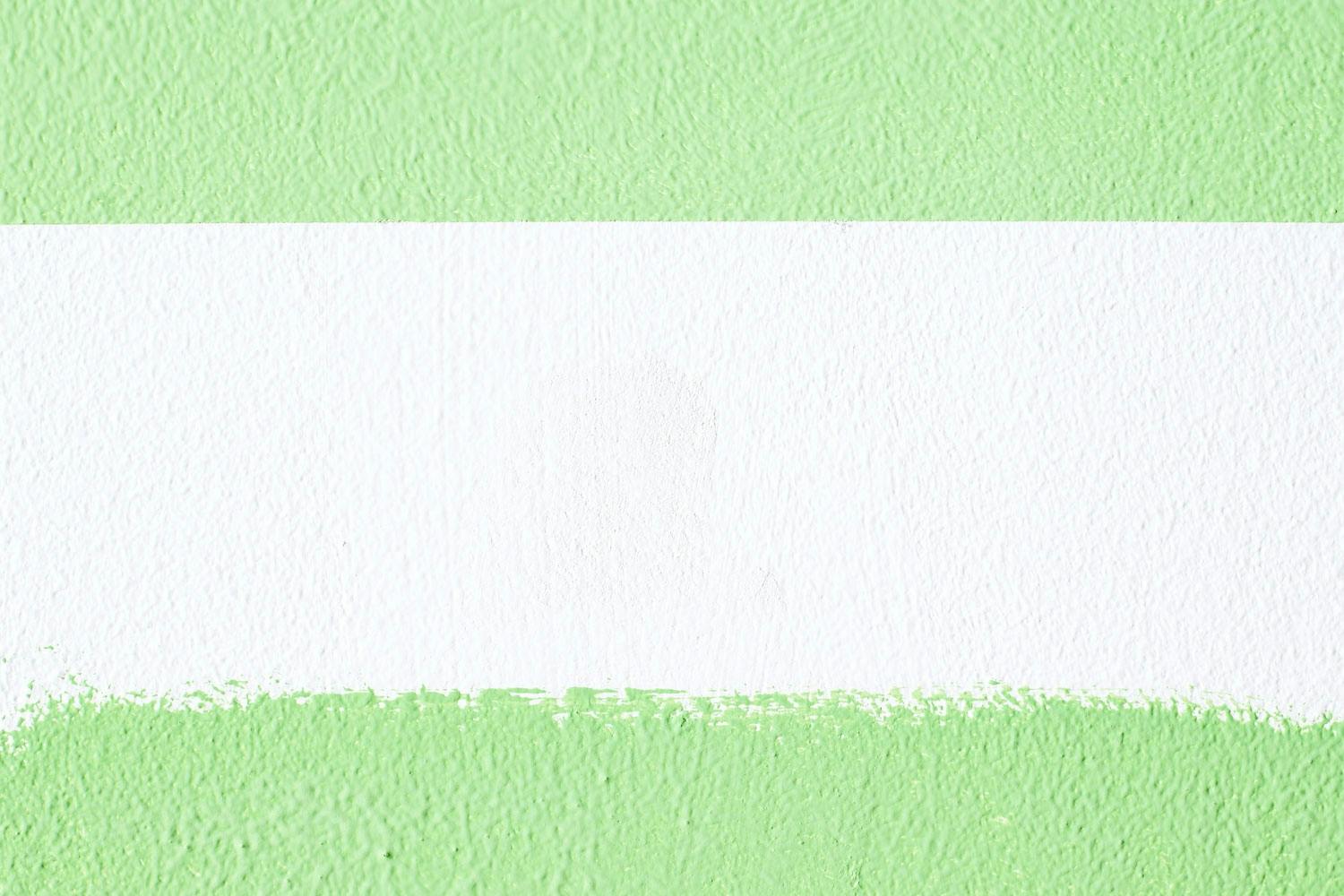 Käytä reunateippiä seinän maalauksessa Käytä reunateippiä seinän maalauksessa